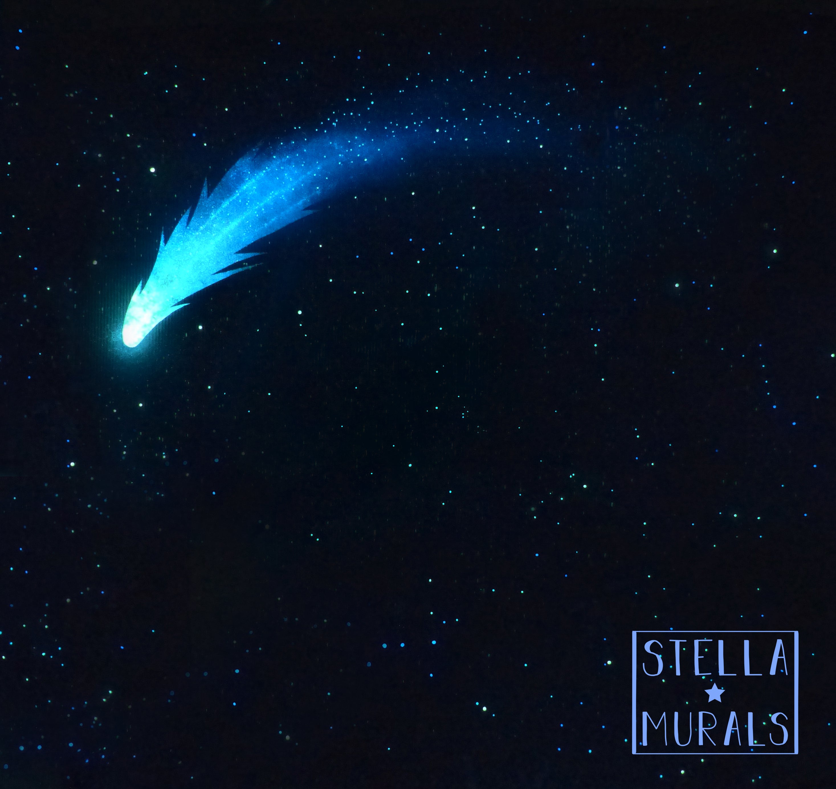 Blue glowing comet painted on a fabric canopy, which can be pinned to the bedroom ceiling. Unique astronomy themed glow in the dark home decor.