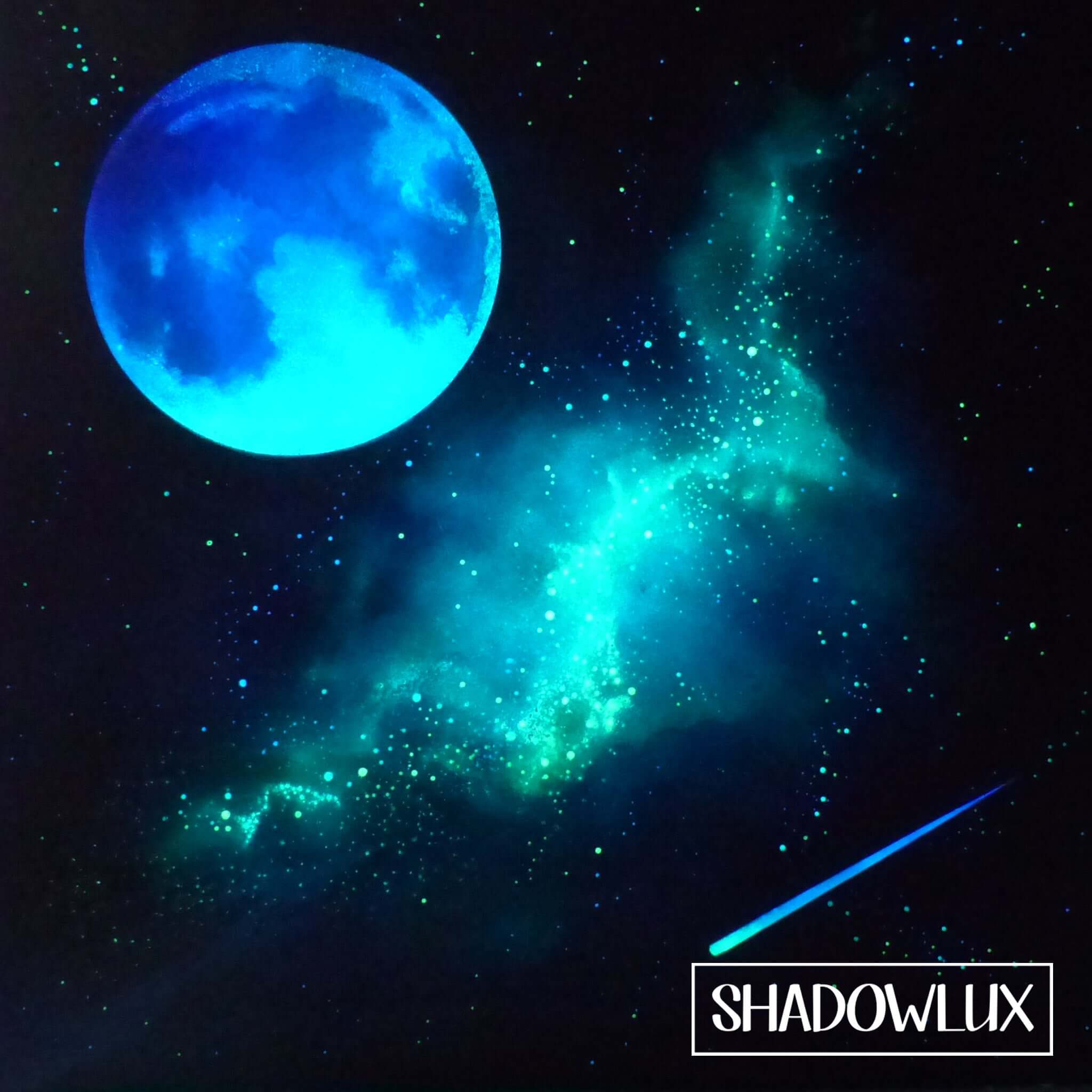 glowing moon art with shooting star