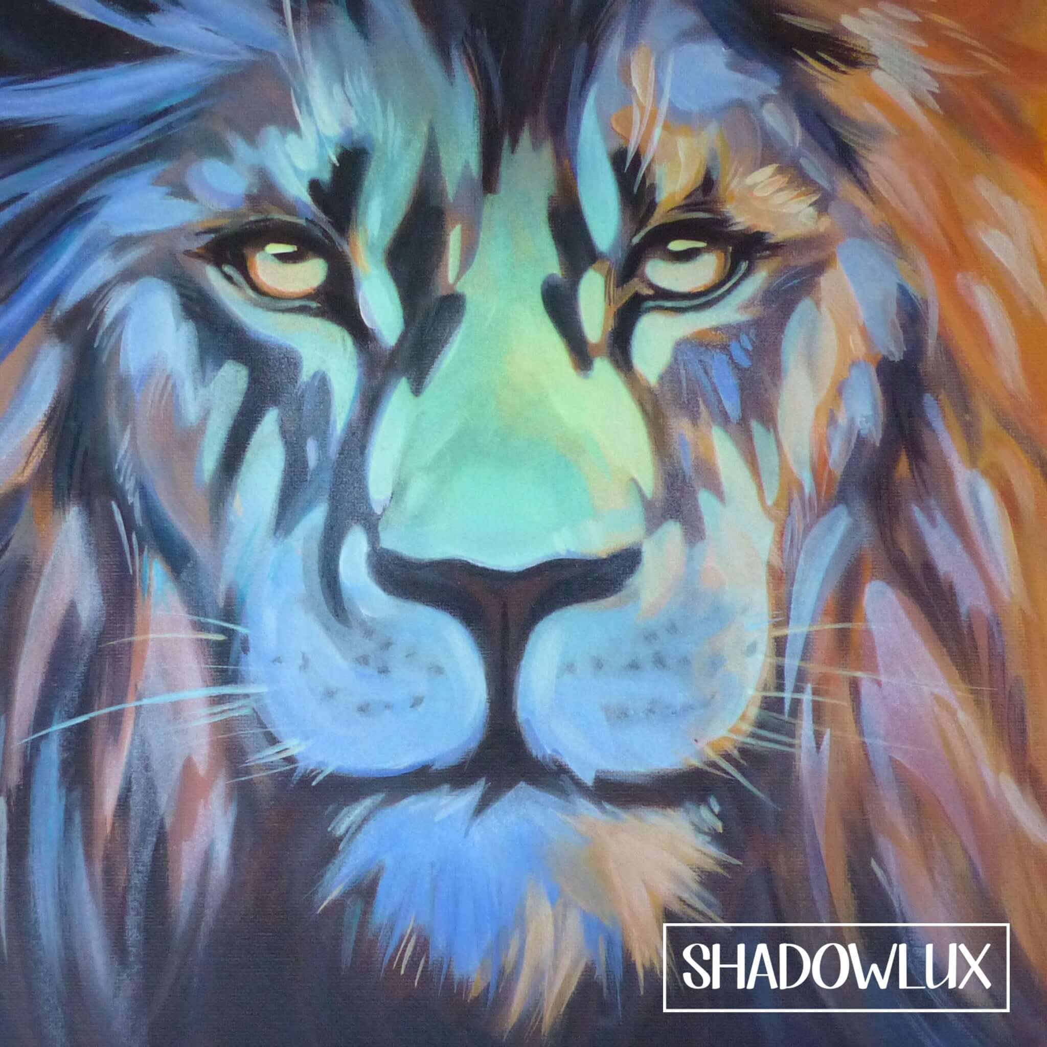 Painting of a lion’s face in warm daylight tones, showing detailed mane and expressive eyes, also showing a tinge of the invisible glow in the dark paint layers on the lions nose.
