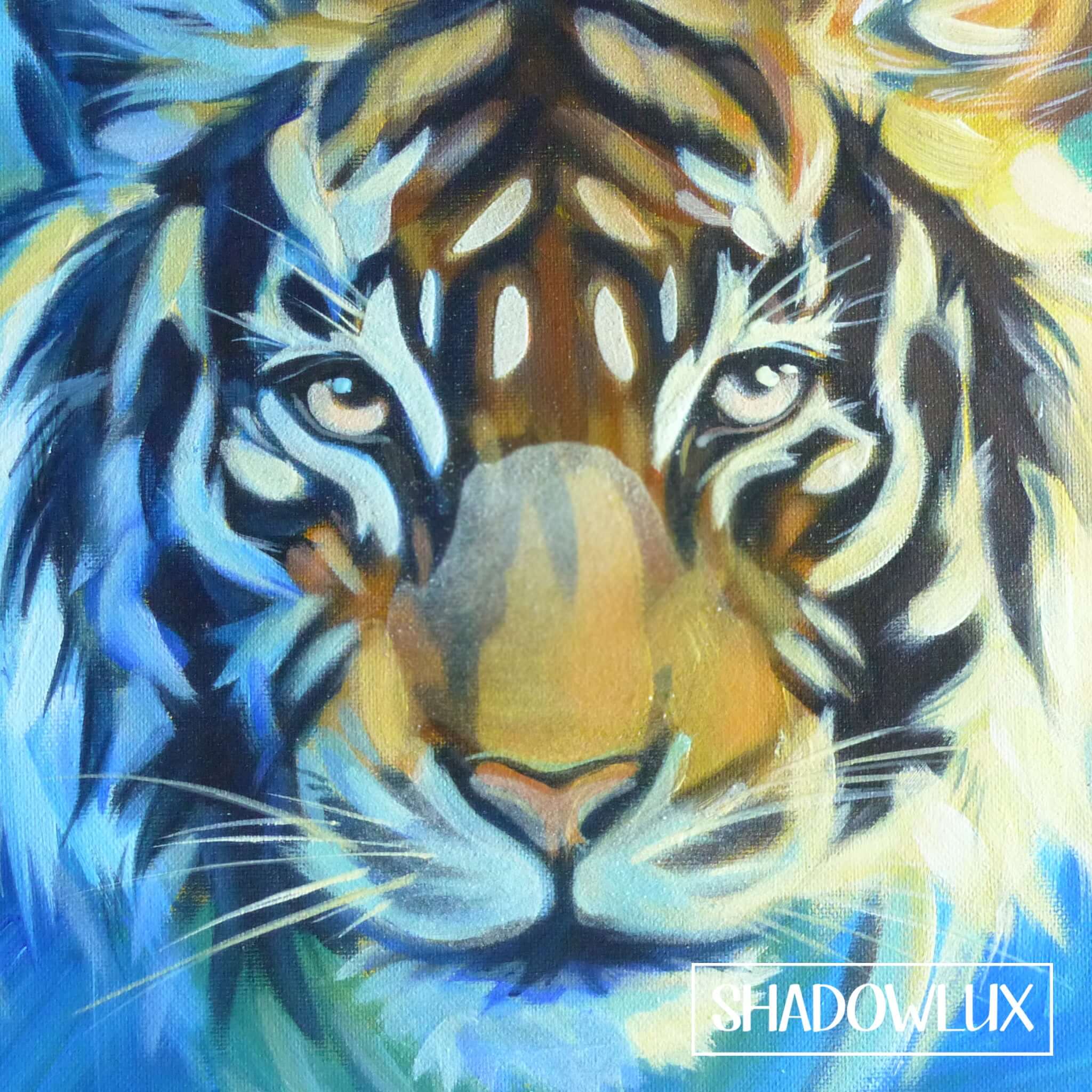Artwork featuring a tiger’s intense gaze and distinctive facial markings, painted in invisible glow in the dark paint