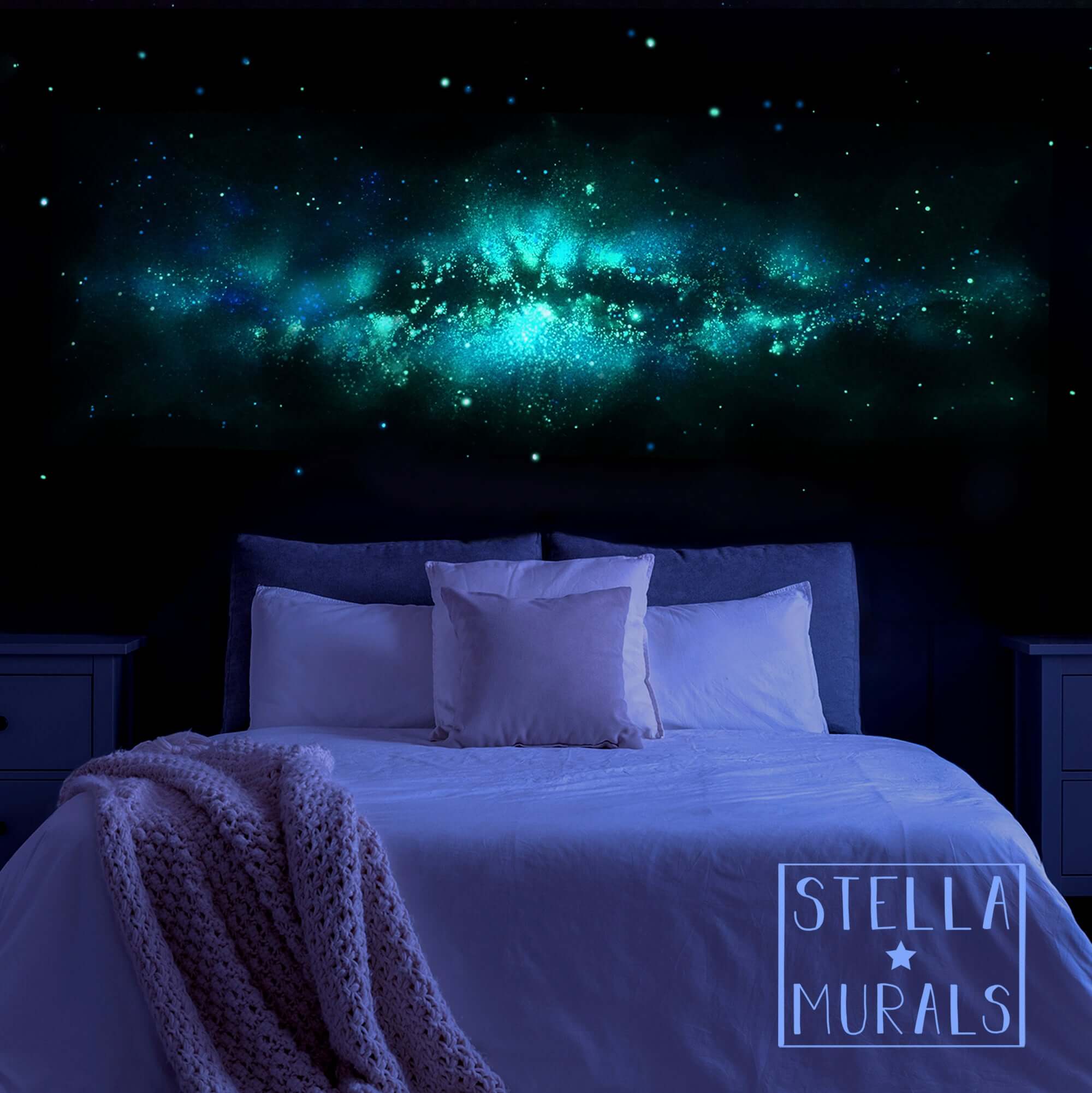 Glow in the dark milky way galaxy art mural. Realistic star stickers on the bedroom wall.