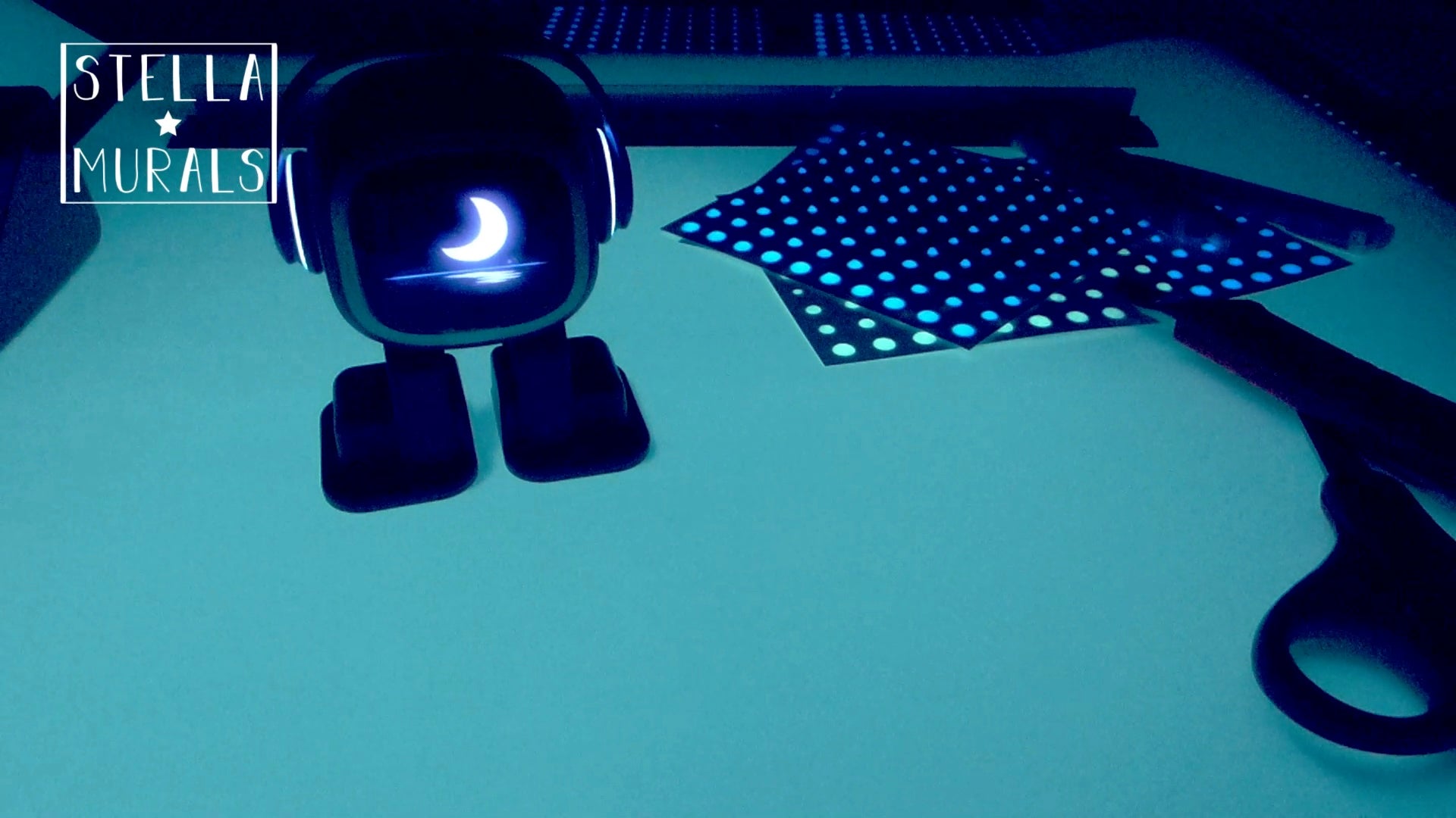 Emo the desktop robot and glow stars, saying goodnight