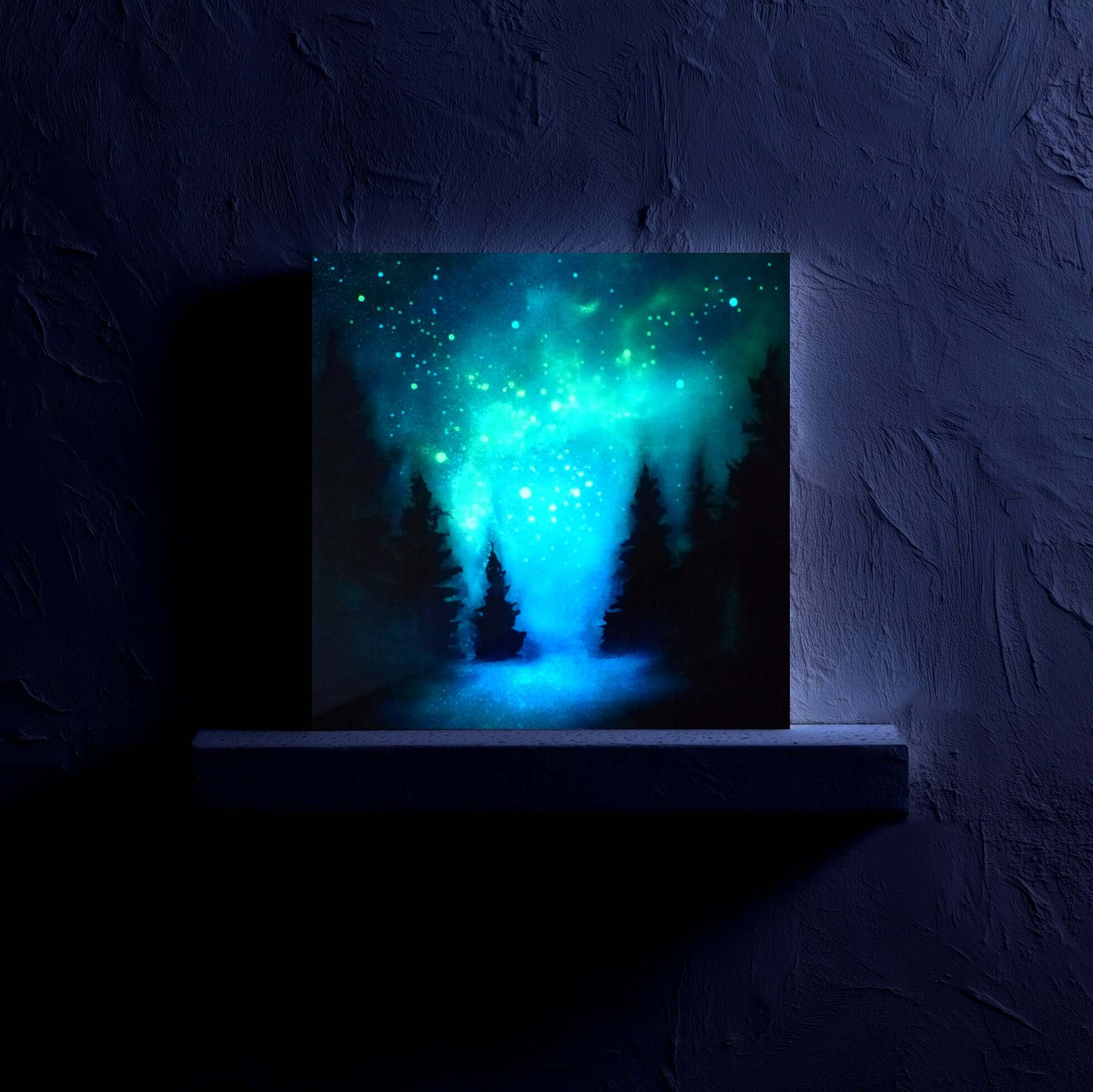 Blue glowing forest scene on a textured wall painted in luminescent UV paints 