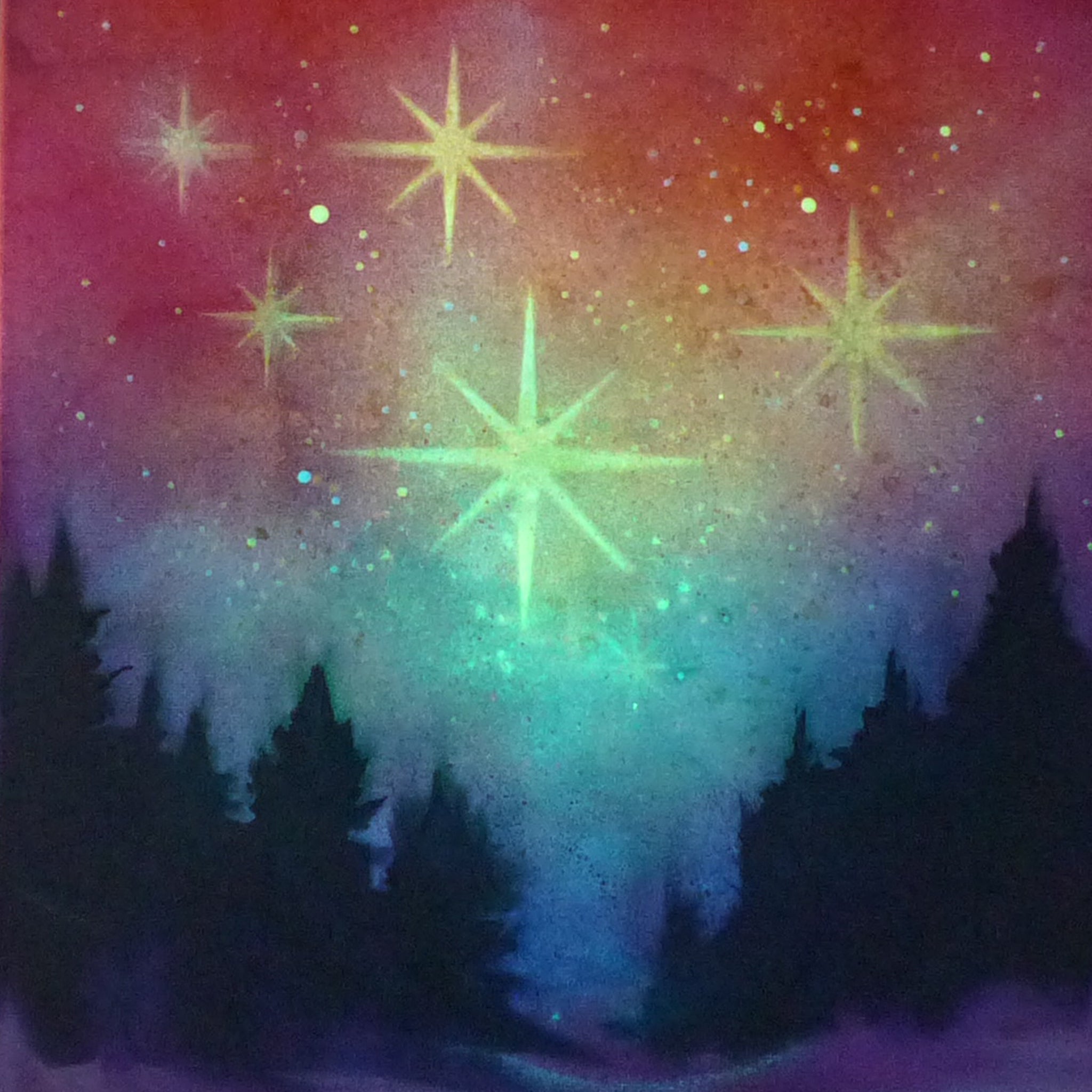 Colorful glow in the dark starry night sky with silhouettes of trees