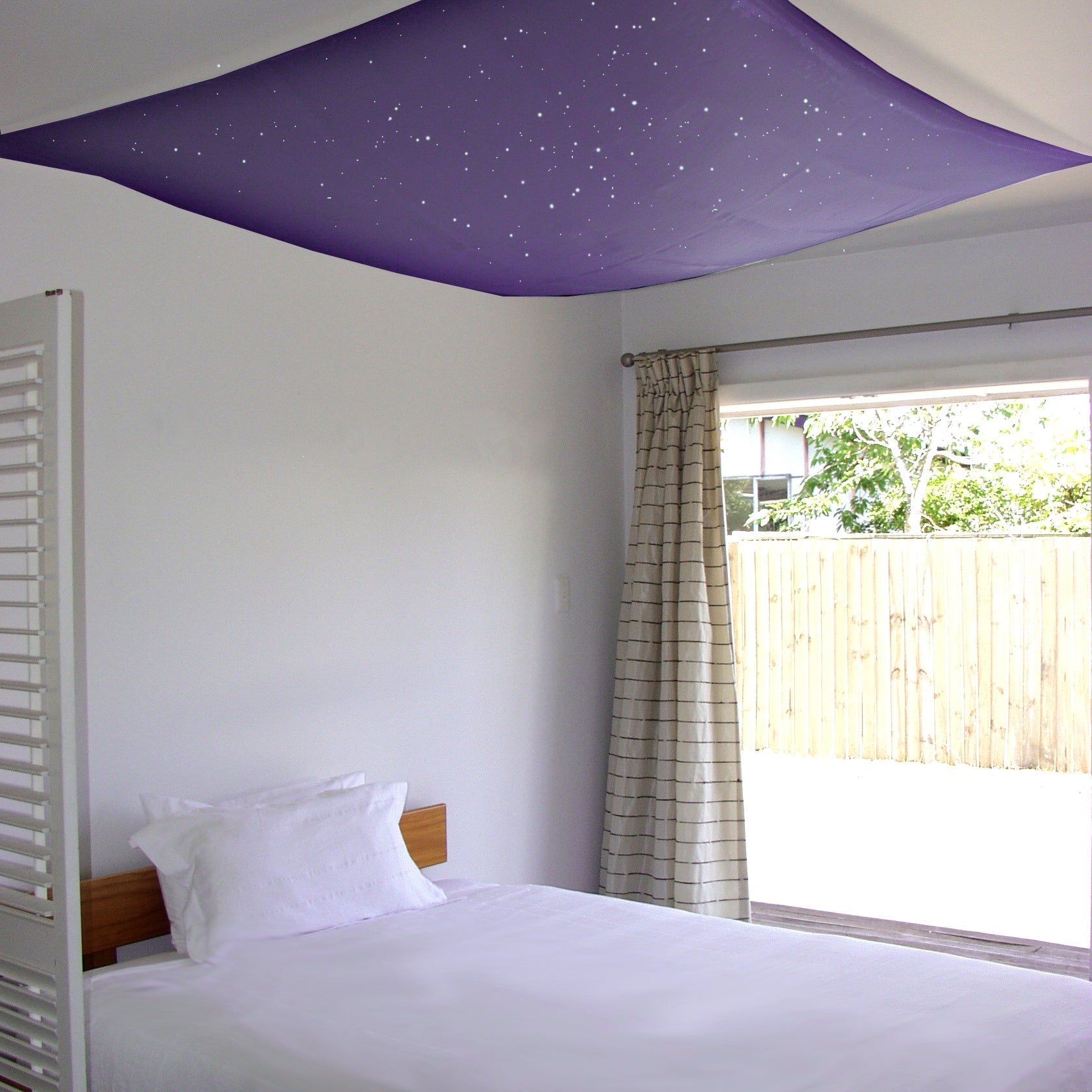 purple glow in the dark star ceiling fabric hanging. Star Canopy for adult master bedroom or a dreamy addition to a kids space themed bedroom