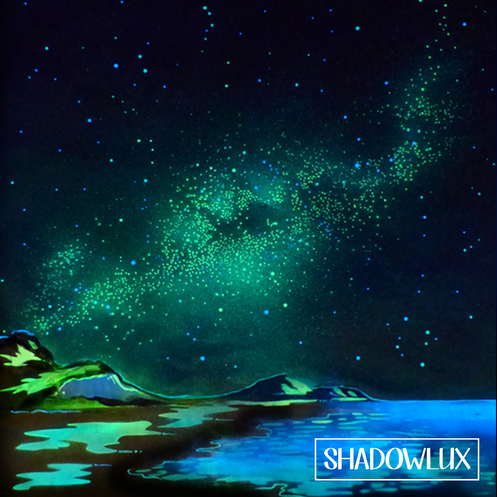 glow in the dark beach painting with milky way
