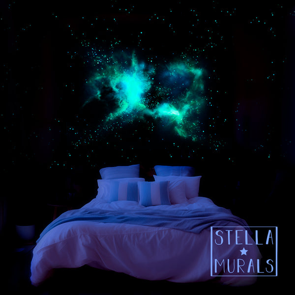 glow in the dark nebula mural on a bedroom wall at night