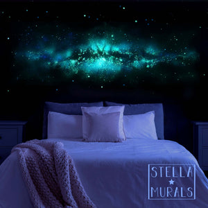 Glow in the dark milky way galaxy art mural. Realistic star stickers on the bedroom wall.