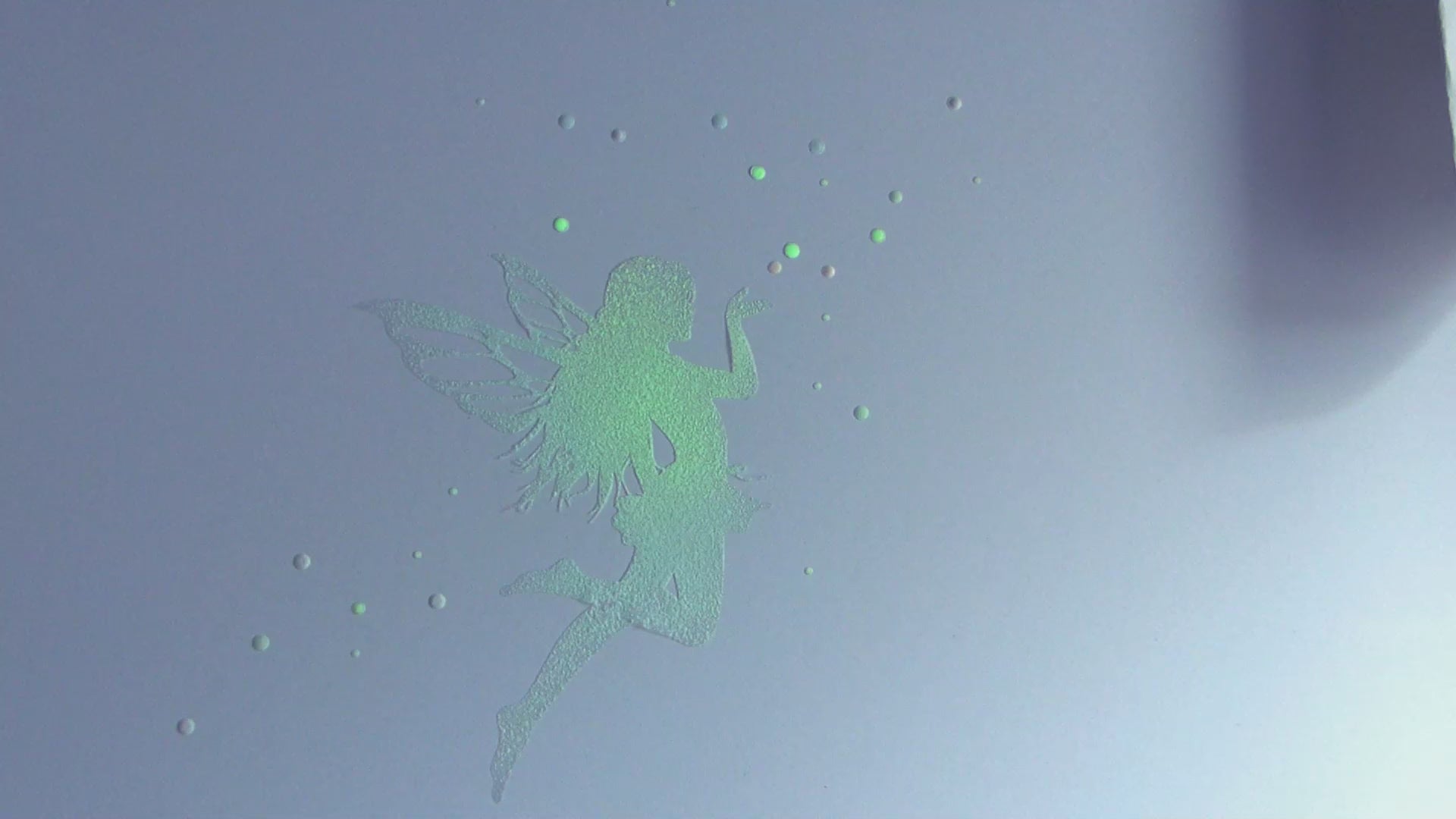 glow in the dark fairy decal with stars on a wall 