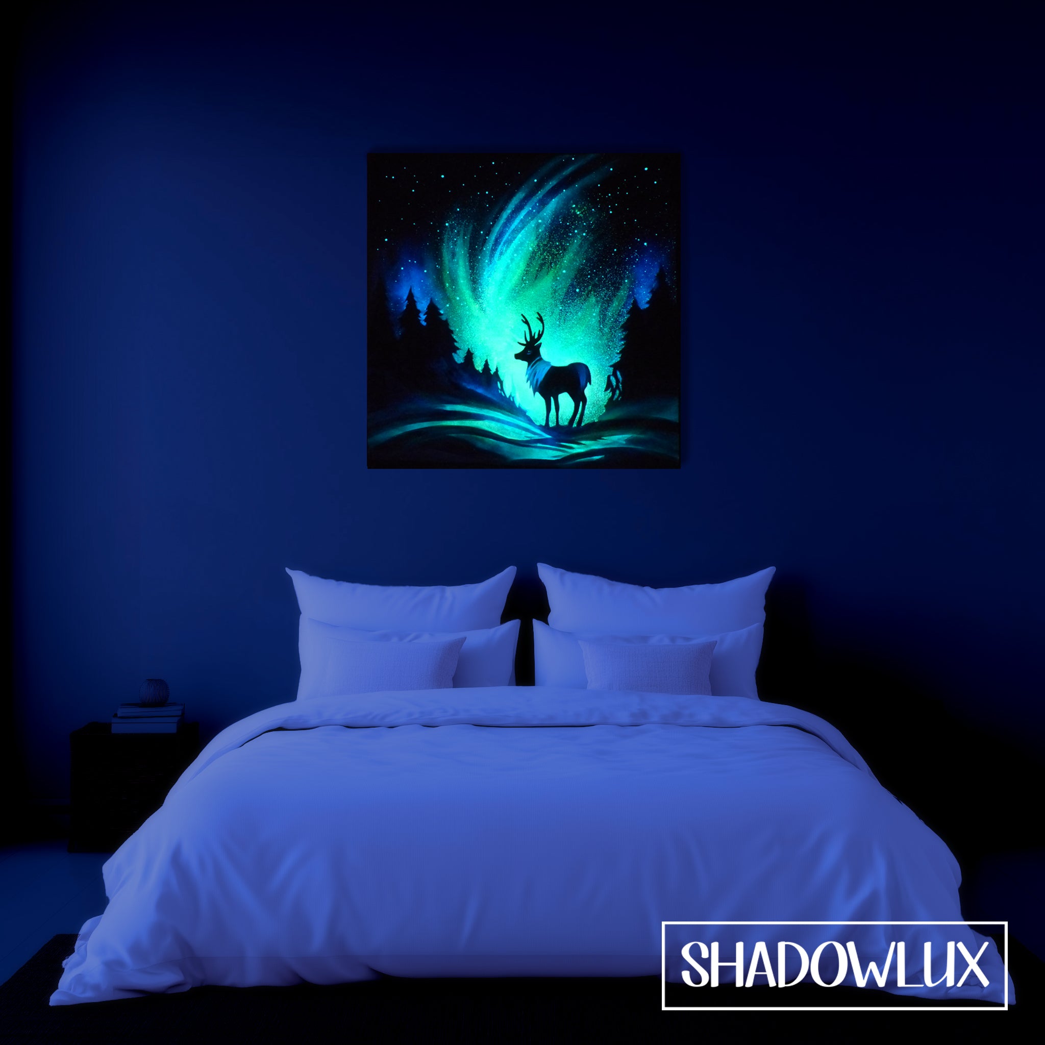 glow in the dark art at night on bedroom wall, deer under aurora in the snow. 
